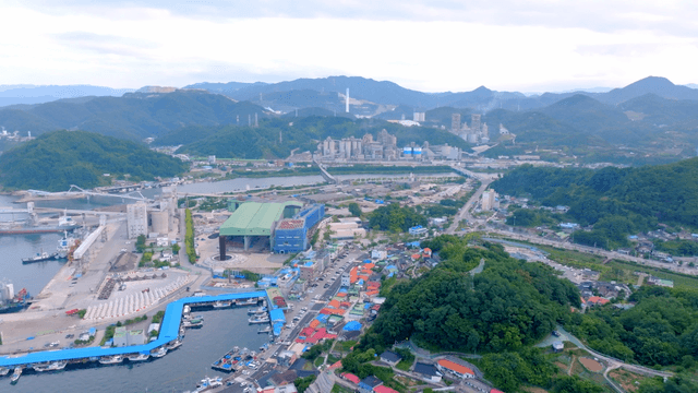 Coastal village with a large port warehouse