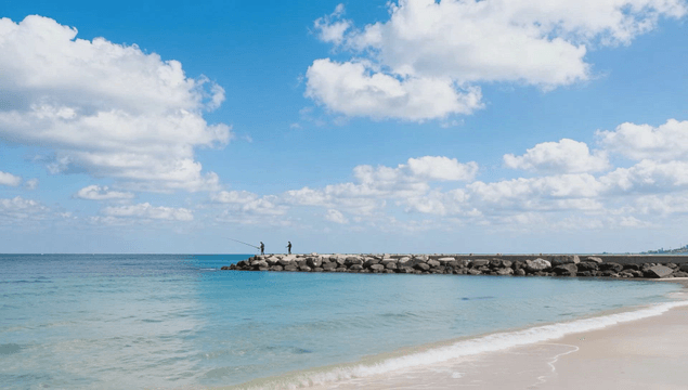 People fishing on a sea pier under clear sky