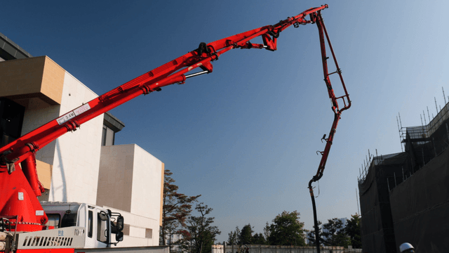 Construction site with a red crane