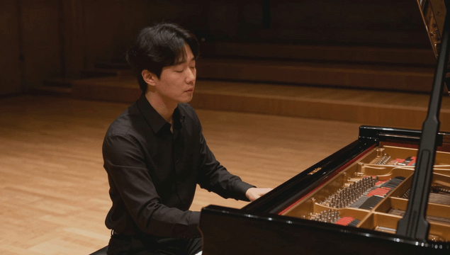Pianist performing classical music on stage