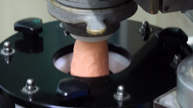 Machine processing dough in a factory