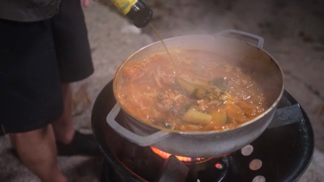 A pot of spicy stew boiling