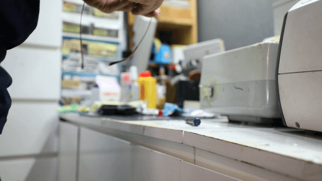 Tightening a screw on eyeglasses