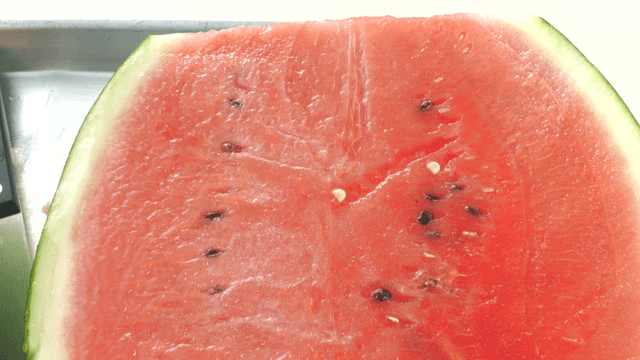 Fresh half watermelon on tray