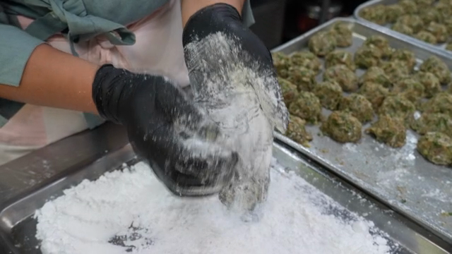 Coating dumpling filling with flour