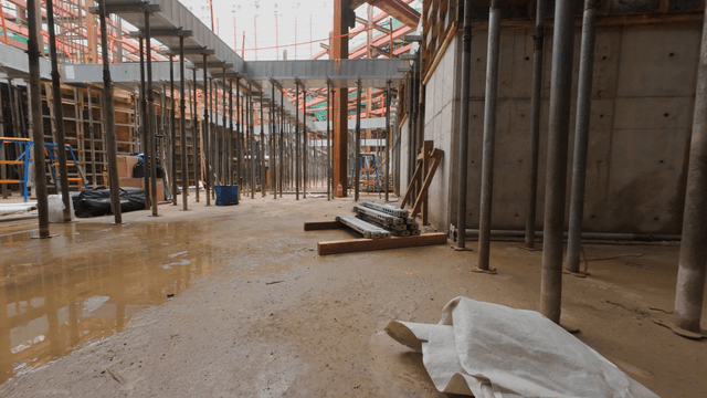 Construction site with metal beams and scaffolding