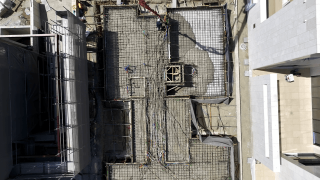 Construction site with workers and machinery