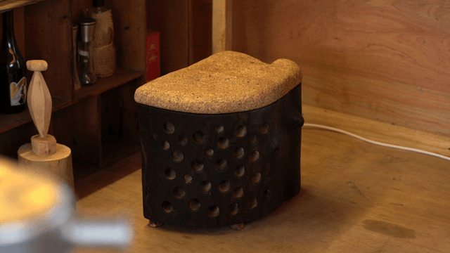 Wooden chair with cork seat in a cozy room