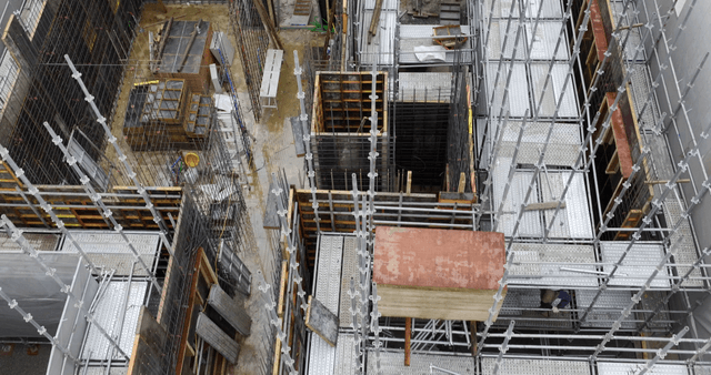 Construction site with scaffolding and materials