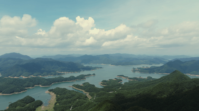 Expansive view of mountains and lakes
