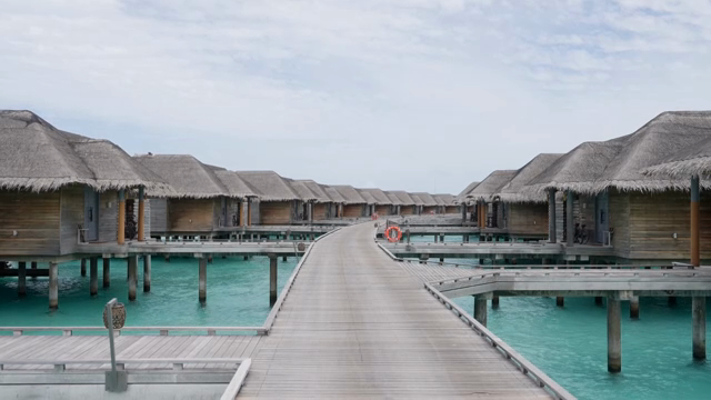 Overwater bungalows on a clear day