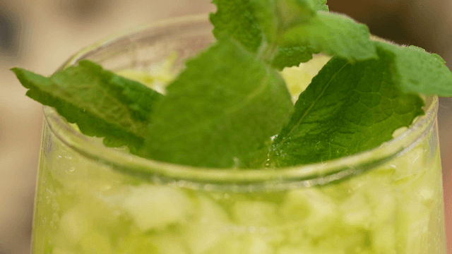 Fresh mint leaves on cucumber ade