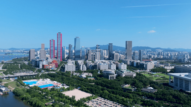 Lively cityscape with high-rise buildings and river