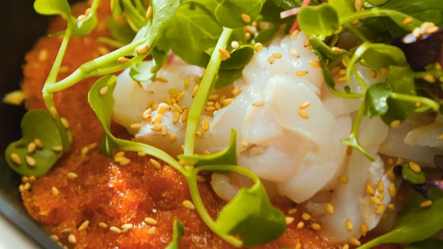 Fresh vegetables and seafood in a bowl