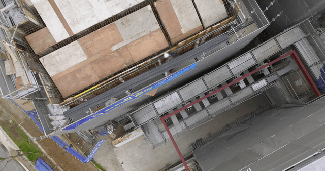 Construction site with scaffolding and rebar
