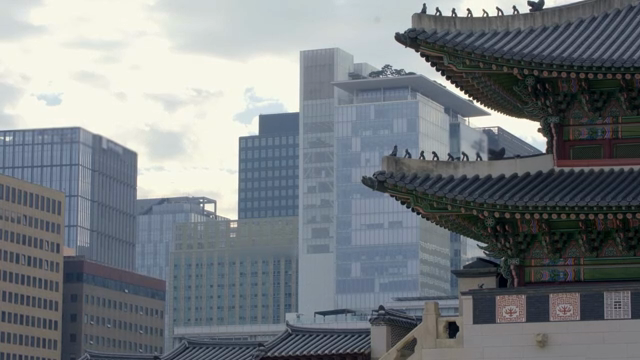 Traditional Korean palace with modern buildings