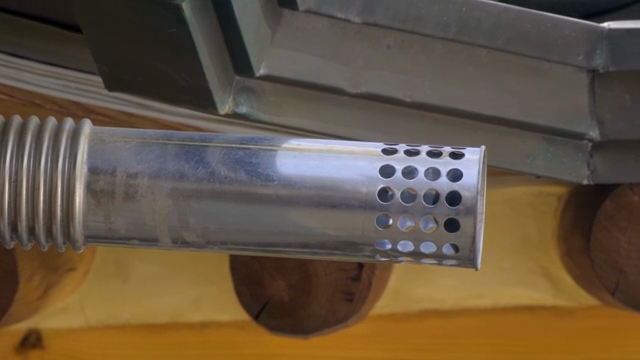 Metal pipe with perforated holes