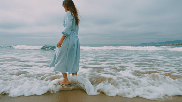 Woman walking on a beach