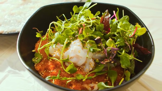 Fresh vegetables and seafood in a bowl