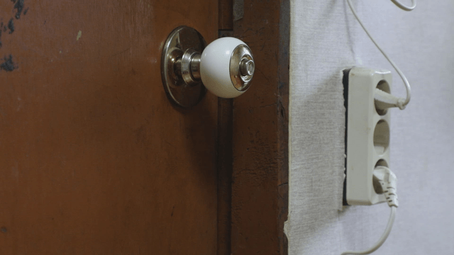 Doorknob and electrical outlet in home