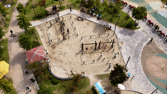 Park view with sand playground and rest area for children