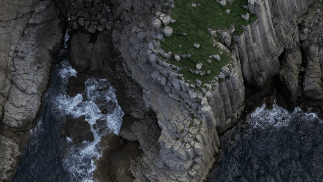 Rocky cliffs with waves crashing below