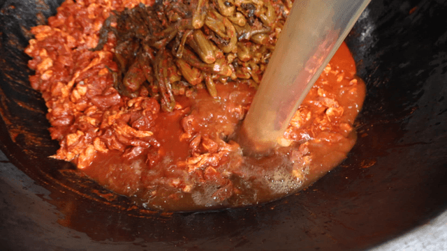Rich broth poured into gatgimchi stew