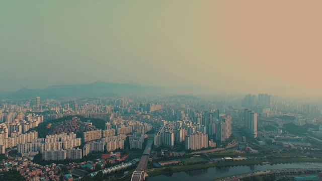 Cityscape unfolding under the sky