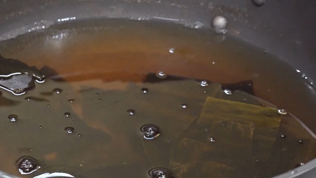 Kelp simmering in a pot of broth