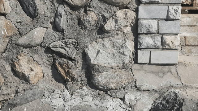 Close-up of a stone wall with bricks
