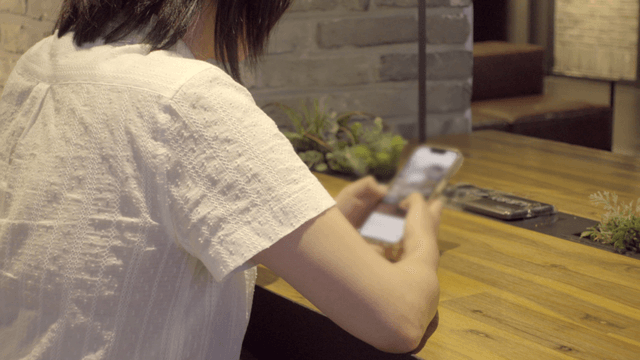 Woman using a smartphone indoors