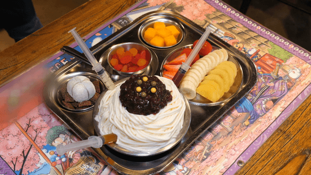 A tray of colorful desserts on a table