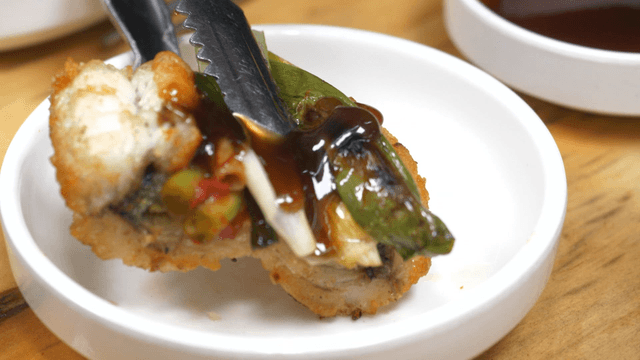 Grilled eels and green onions drizzled with soy sauce