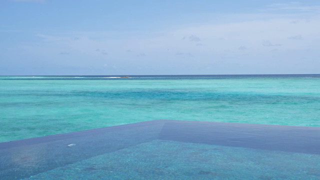 A tranquil sea with clear blue water