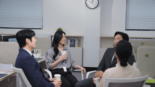 Office workers having a casual meeting