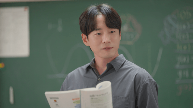 Teacher giving a lecture in a classroom