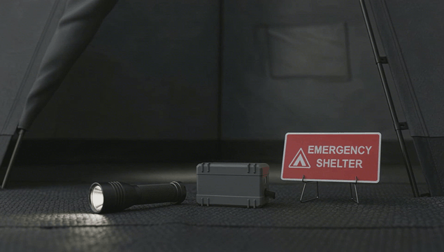 Emergency shelter with flashlight and signage