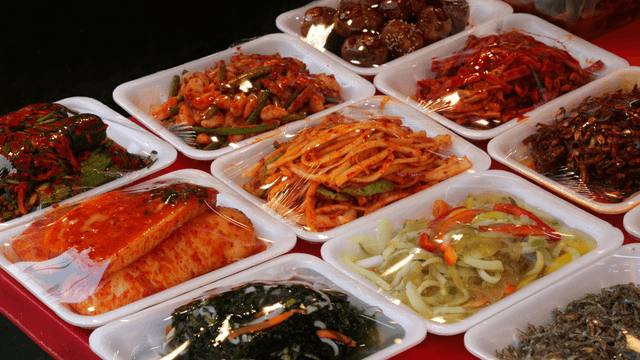 Various Korean side dishes on display