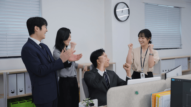 Office workers discussing a project