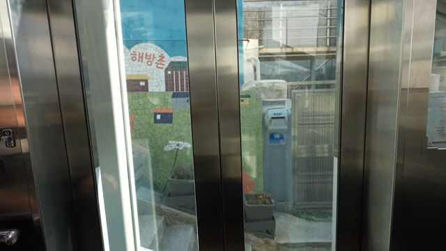 Elevator view of colorful mural