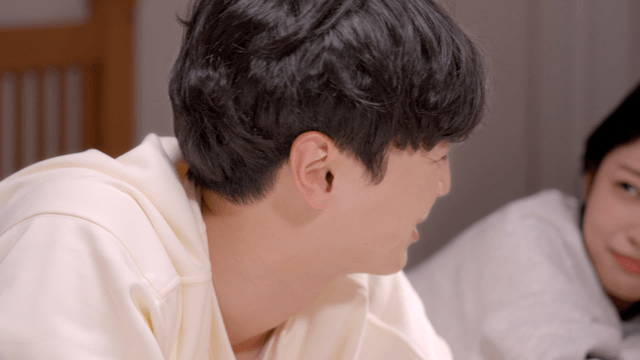 Couple lying down and talking together