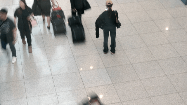 People walking in a busy terminal