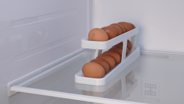 Eggs neatly arranged in a refrigerator
