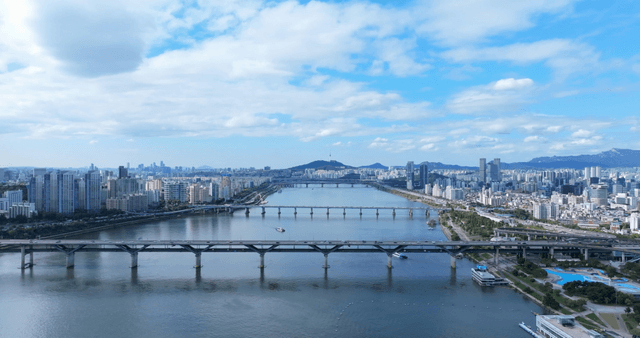 River flowing through bustling city