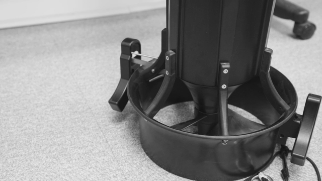 Black industrial machine on carpet