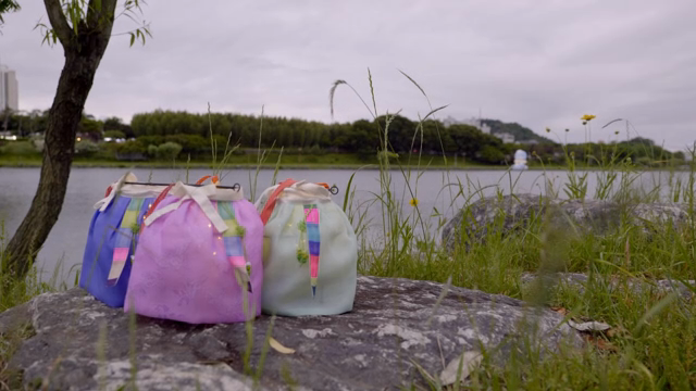 Colorful traditional lantern by a riverside