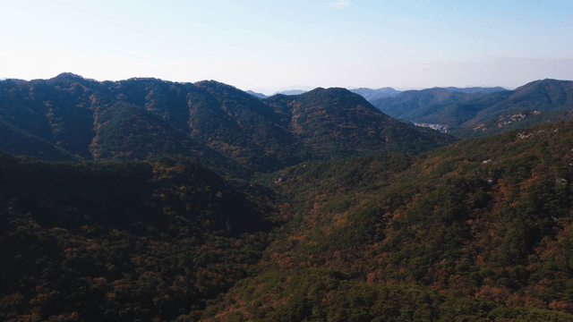 Vast mountain range with lush greenery