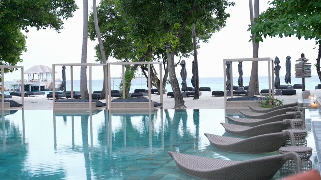 A serene beachside resort with a pool