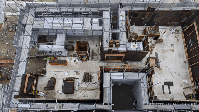 Construction site with scaffolding and materials