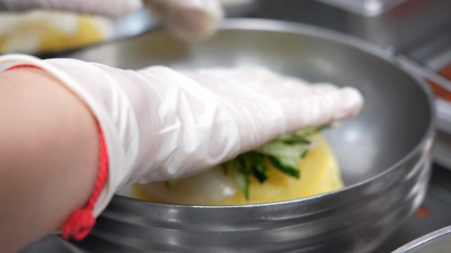 Preparing Cold Buckwheat Noodles topped with radish and cucumber
